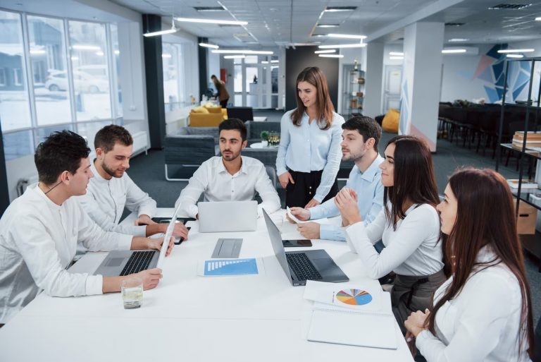 Office Employees Discussing