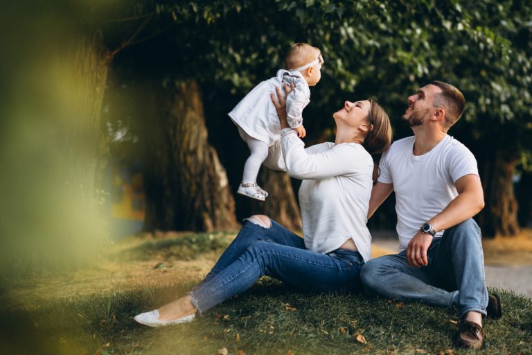 young-family-with-their-small-daughter-autumn-park-2